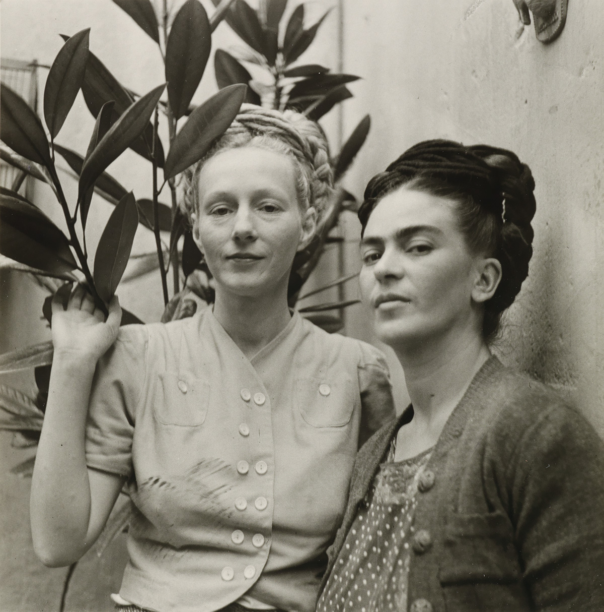 (DIEGO RIVERA) (1886-1957) Frida Kahlo and Emmy Lou Packard, in Coyoacan.